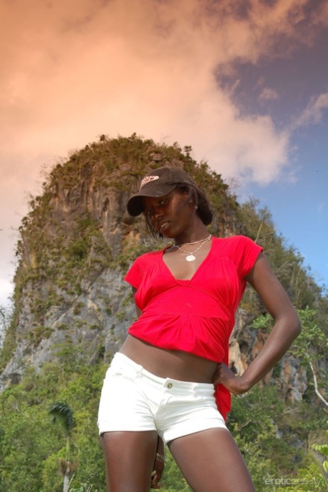 Exotic ebony Maria L strips naked to show her hot chocolate body outdoors