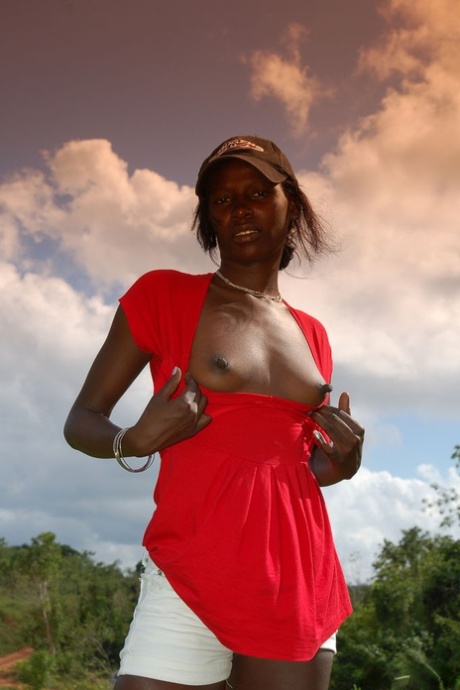 Exotic ebony Maria L strips naked to show her hot chocolate body outdoors